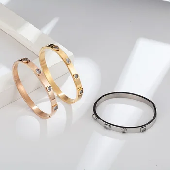 Rostfritt Stål Mode Smycken Som Kvinnor Bangle Guld Manschett Armband Crystal Bröllop Ringar Till Kvinnor Män Smycken Som Present